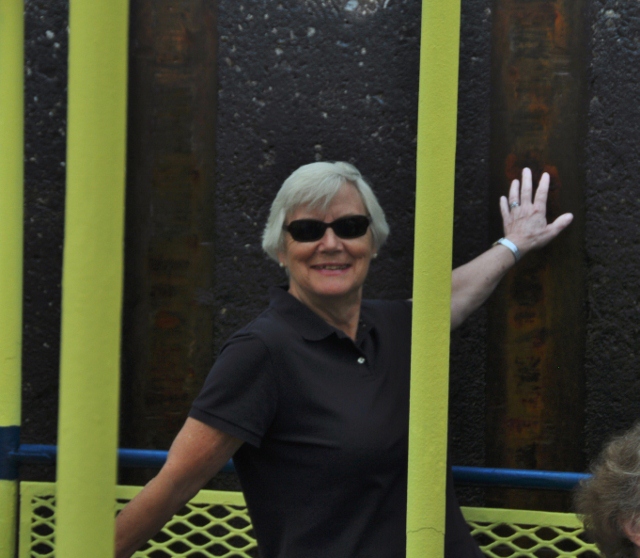 Linda touching wall of the lock